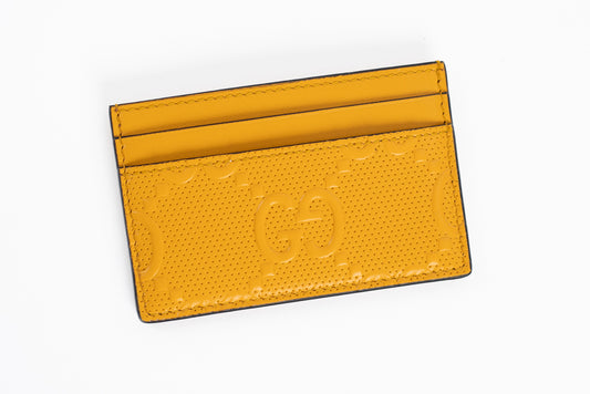 Gucci GG embossed leather card case.