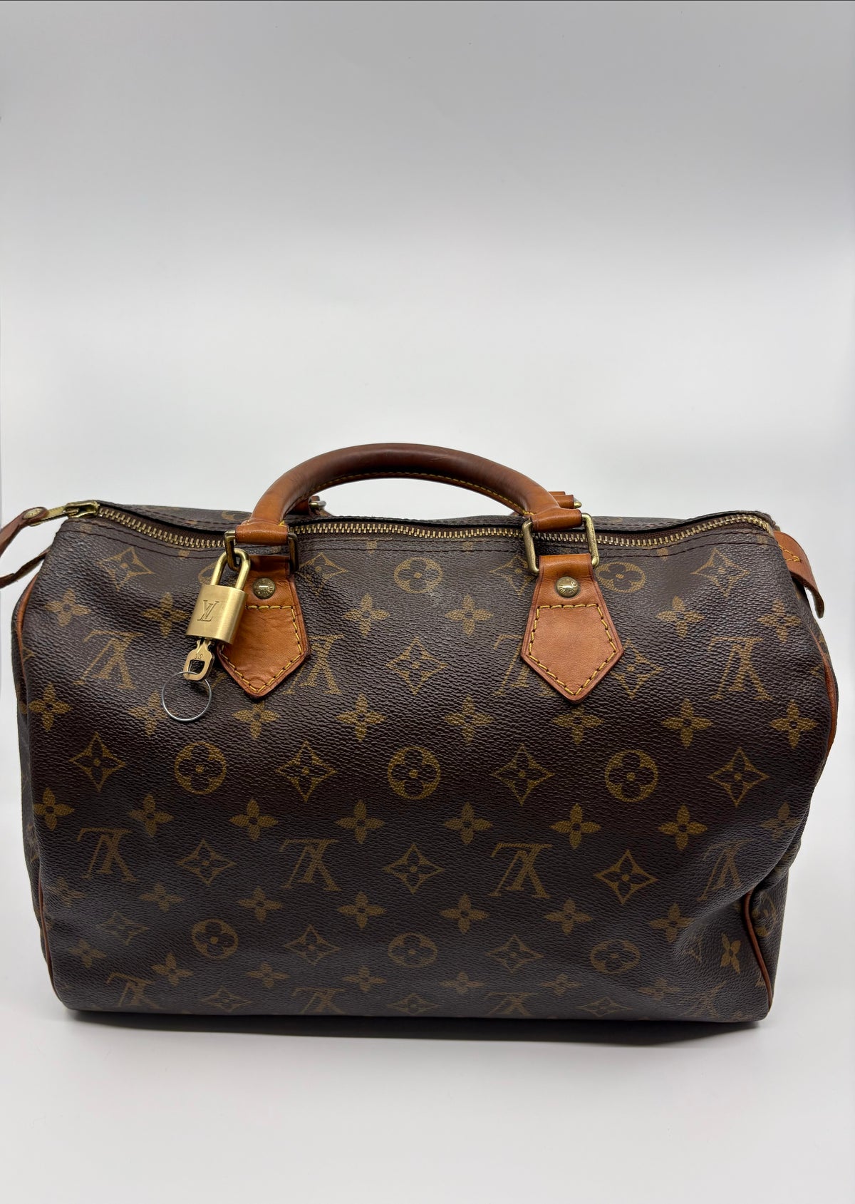 Louis Vuitton Monogram Speedy Handbag (includes Padlock & Key)