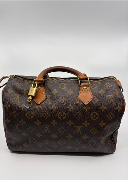 Louis Vuitton Monogram Speedy Handbag (includes Padlock & Key)