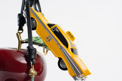 Coach – “Large New York Cluster Bag Charm”