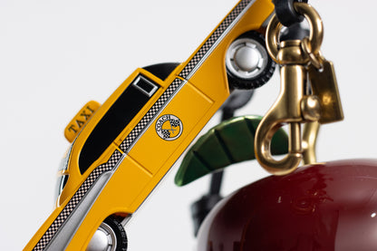 Coach – “Large New York Cluster Bag Charm”