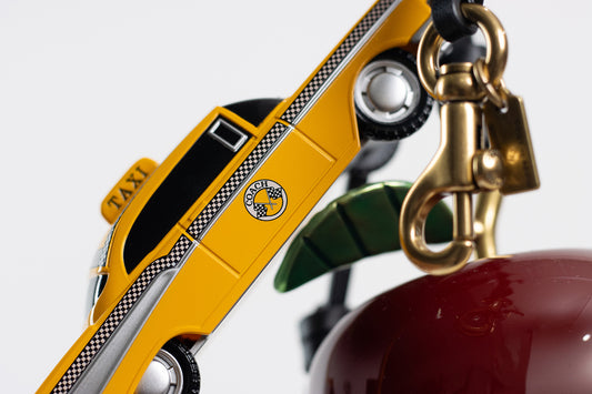 Coach – “Large New York Cluster Bag Charm”